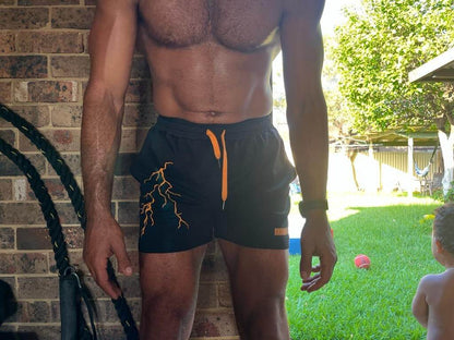 Raiden Shorts - Black / Orange